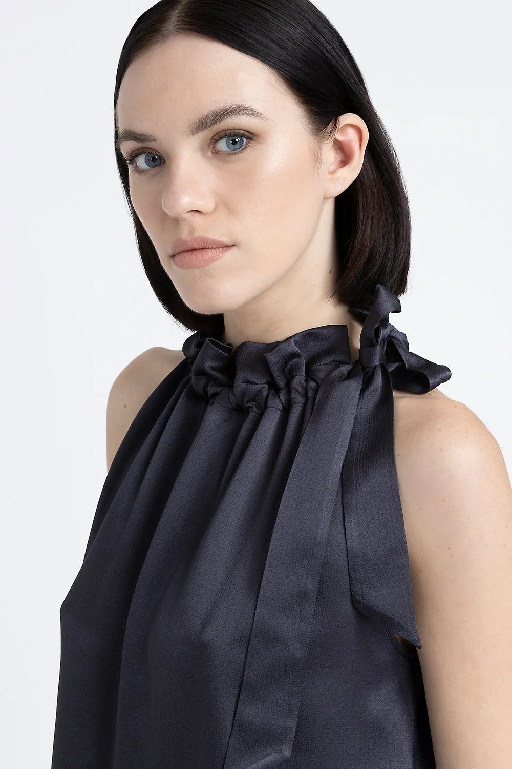 Top with ruffled collar